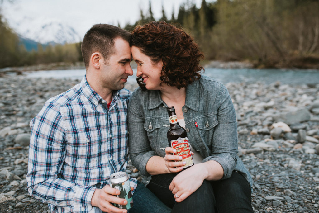couple drinking beer during engagement session