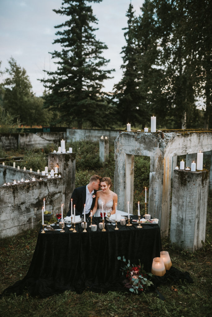 Aerial view of game of thrones themed wedding tablescape, dark and moody wedding theme