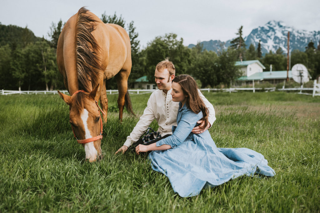 Couple with horse for their engagement session