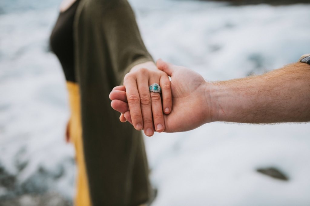 Detail photo of a turquoise engagement ring during a Matanuska Glacier engagement session by Donna Marie Photography.