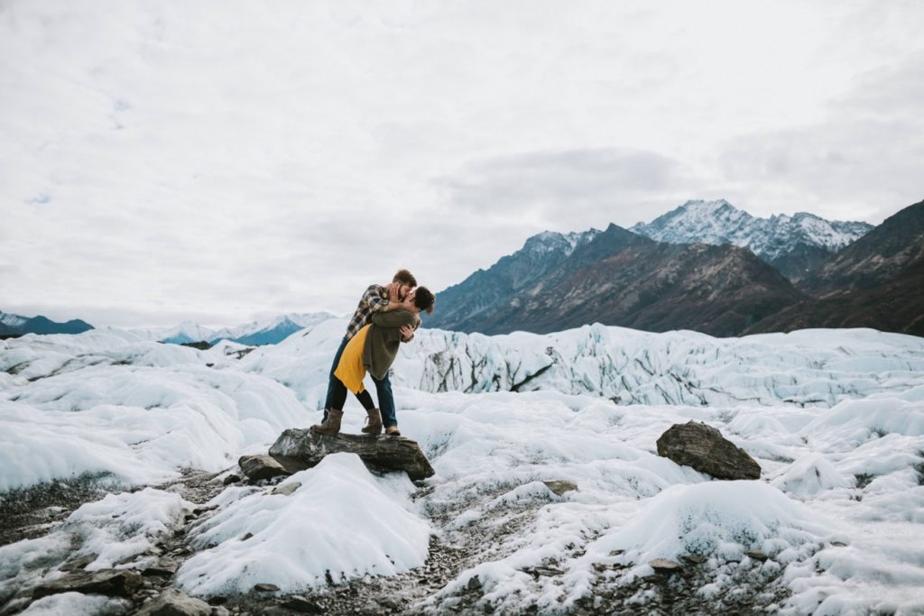 Dip kiss during engagement session on Matanuska Glacier.