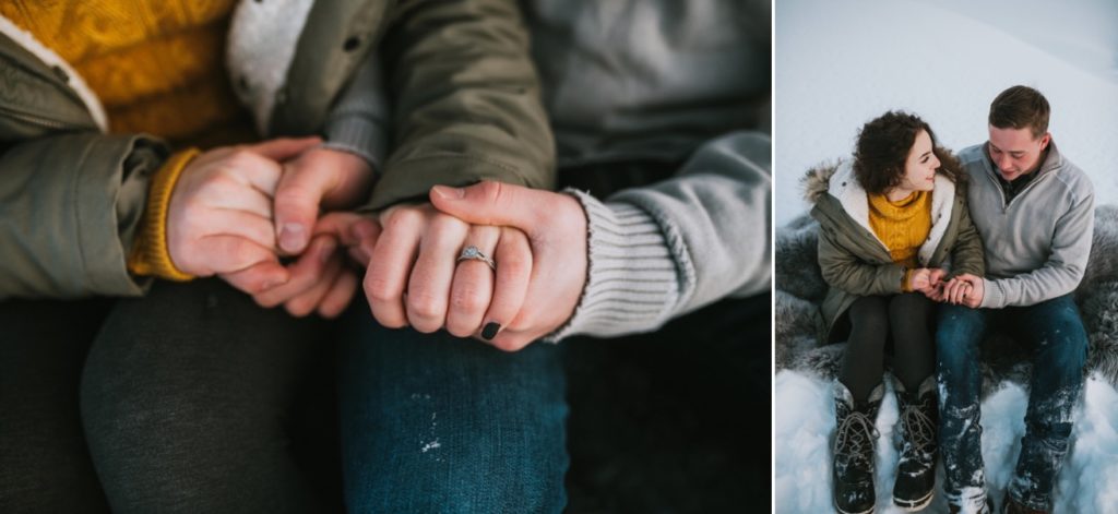Couple holding hands and showing engagement ring during Hatcher pass engagement.