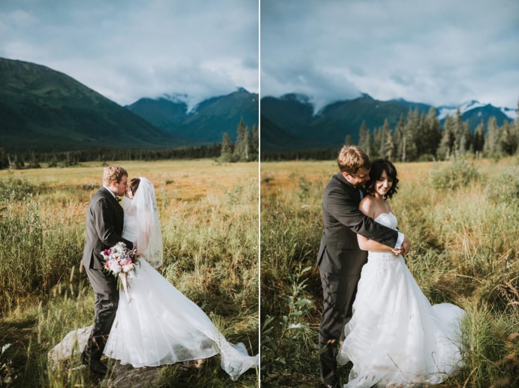 Bride and groom smiling and laughing in a field at Alyeska elopement