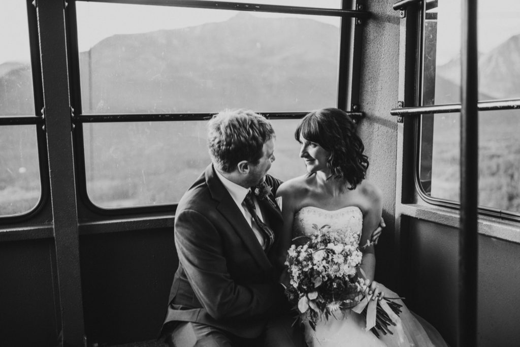 Bride and groom riding up in Alyeska tram