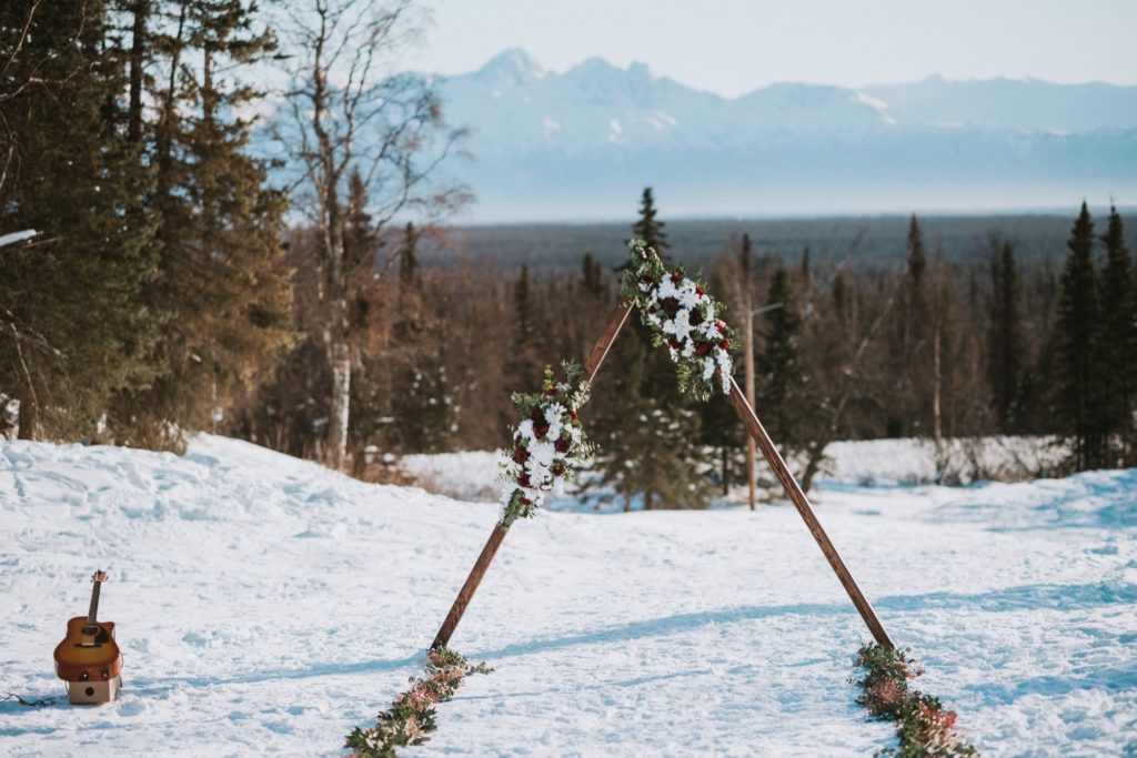 Triangle wedding arch from Alaska winter wedding at Government Peak Chalet