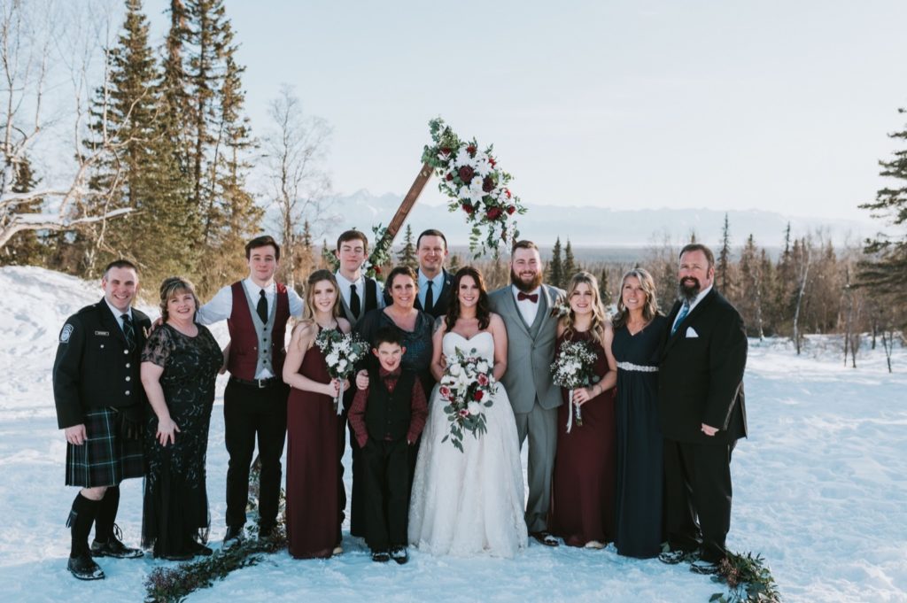 Family photo during Alaska winter wedding