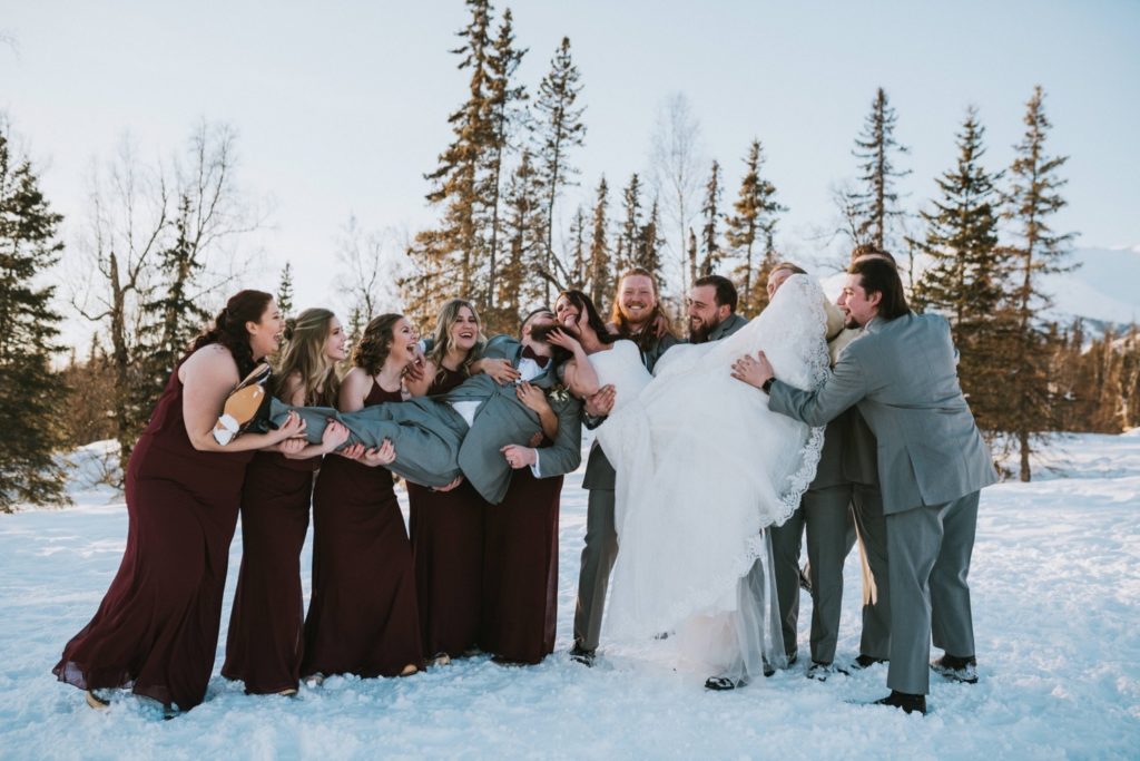Silly photo of wedding part at Alaska winter wedding