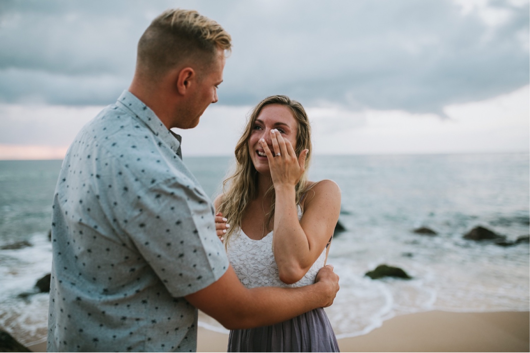 Couple tearing up after proposal 