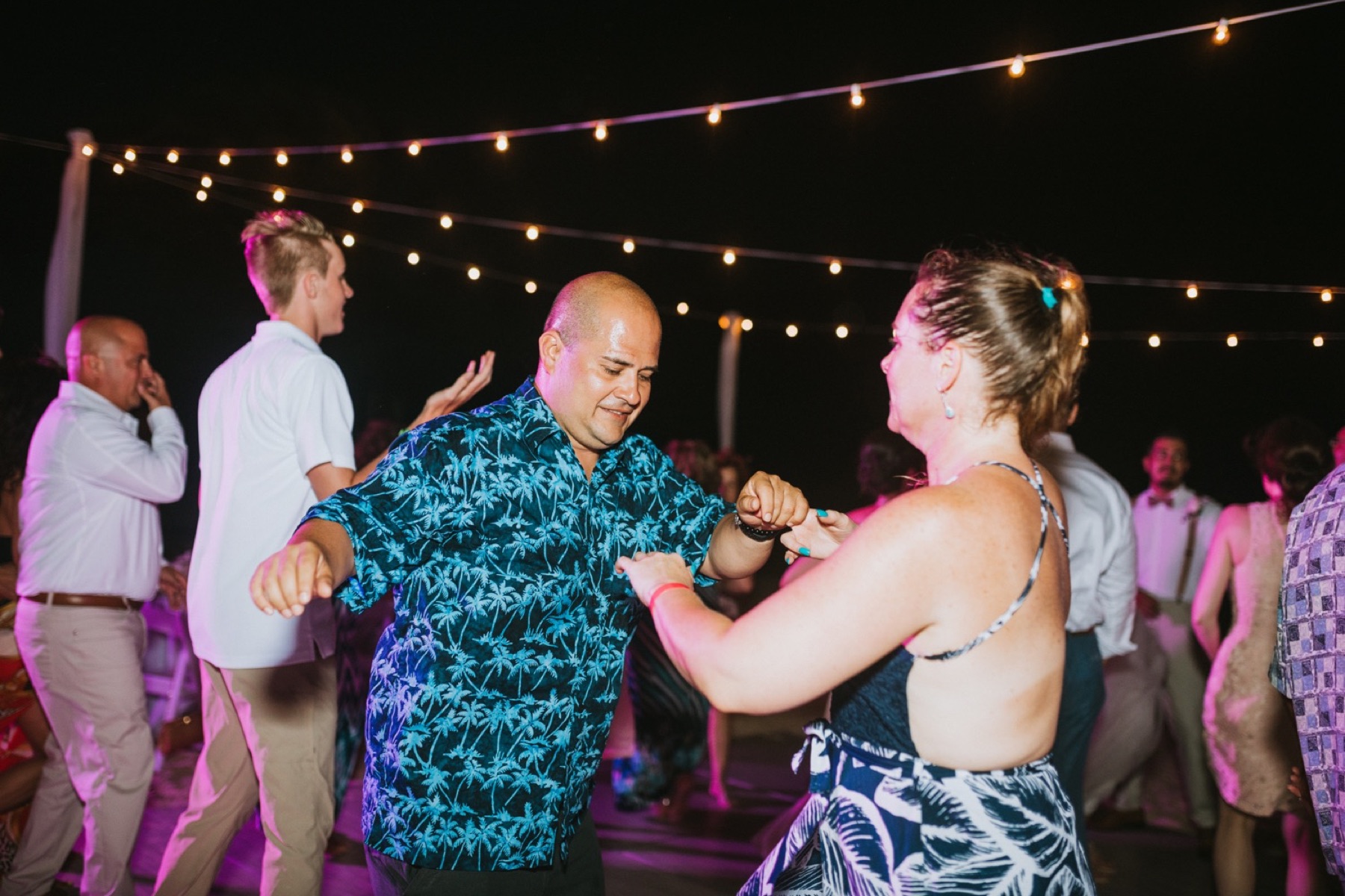 Family dancing at wedding in hard rock punta cana