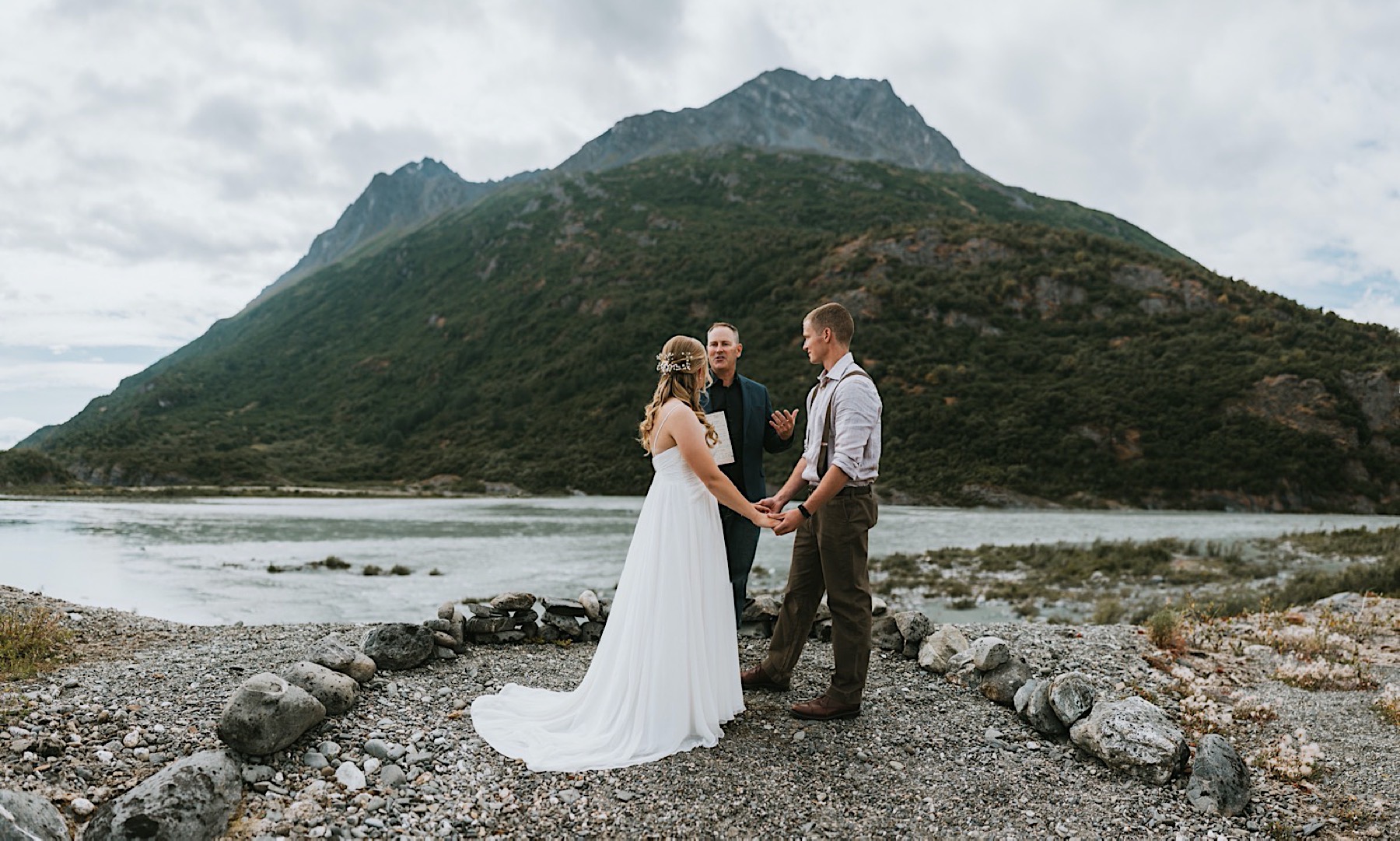 Bride and groom during their alaska destination wedding ceremony