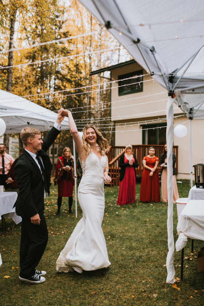 Couple dancing in backyard after Micro Wedding