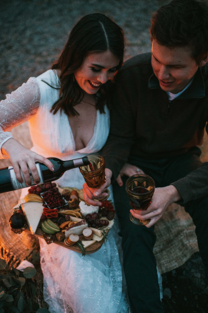 Couple enjoying a glass of bear creek winery wine