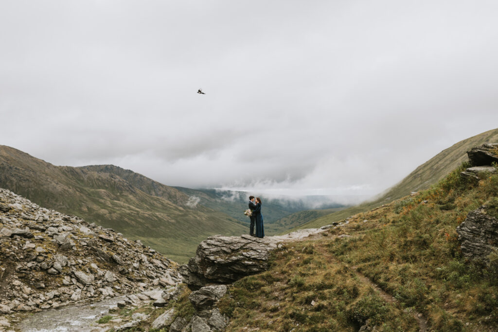 couple standing in hatcher pass on their elopement day