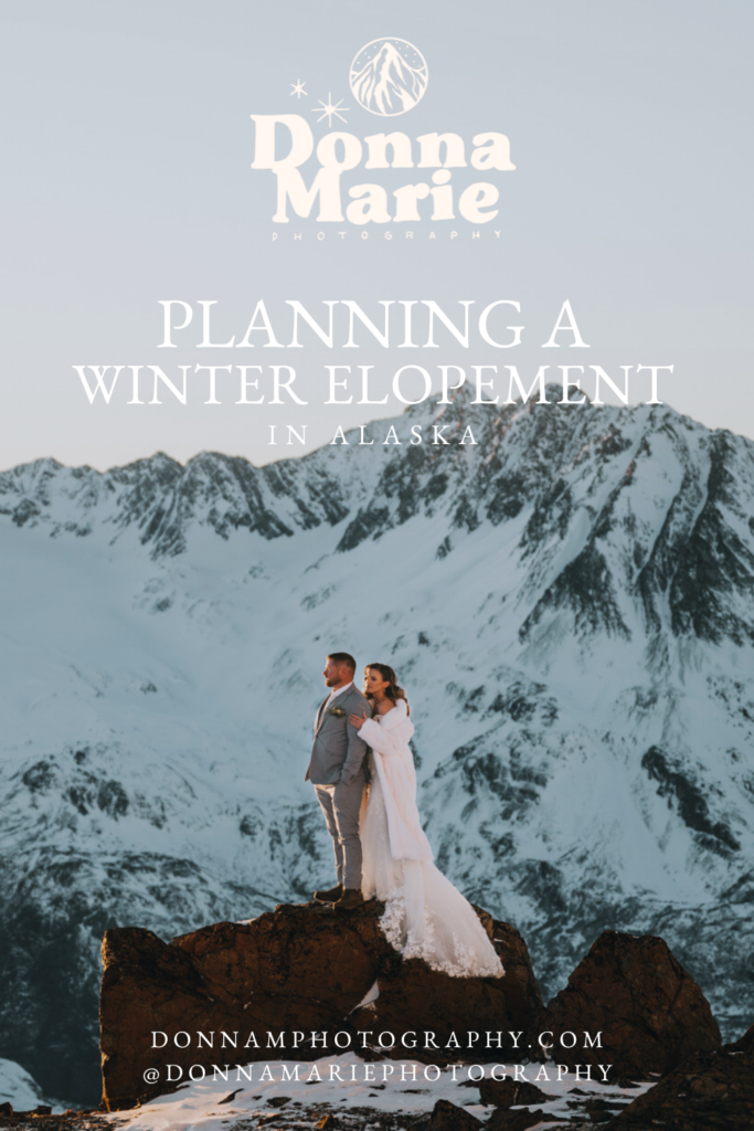 A couple in wedding attire stands on a rock with majestic, snow-capped mountains in the background. Text reads, "Dreaming of a Winter Elopement? Discover the magic of Alaska.